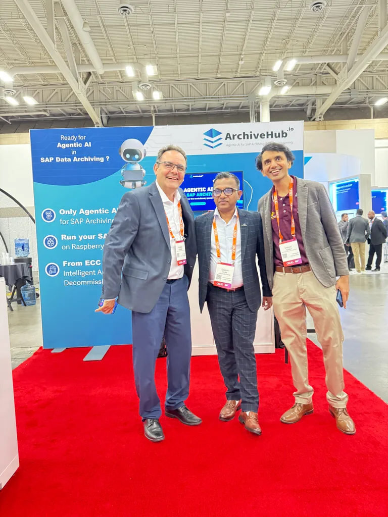 ArchiveHub team and guest at the ASUG Tech Connect 2025 booth in Louisville
