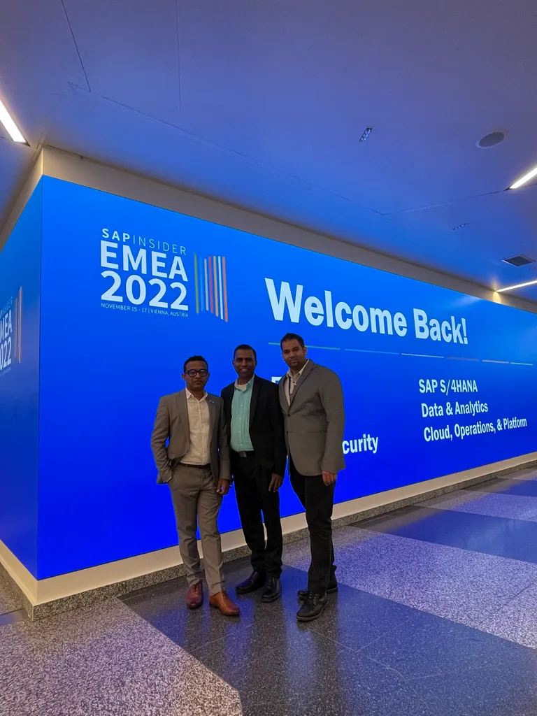 ArchiveHub team at the SAPinsider EMEA 2022 welcome display in Vienna